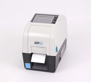 ATP-30 labelprinter tijdens het printen van een wit label