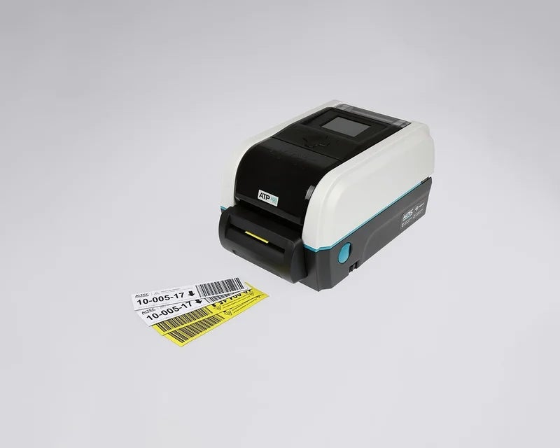 ATP-300 Pro labelprinter voorzien van een ATP Cutter Module waarmee geprinte labels automatisch op de gewenste lengte worden afgesneden
