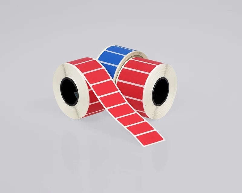 Rollen security labels met overdracht voor fraudebestendige verzegeling van verpakkingen en producten.