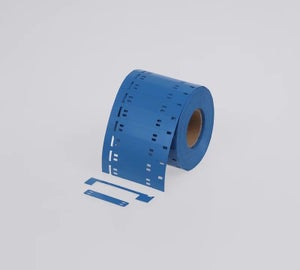 Rol met blauwe metal detectable kabelmerkers voor de voedingsindustrie