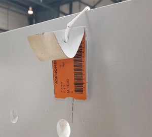 WetPaintCard met deels losgemaakt beschermlaminaat voor extra bescherming