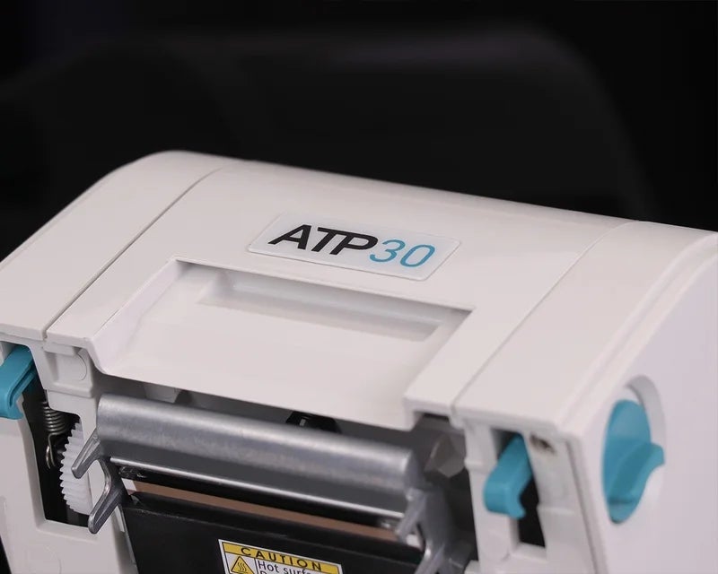 Geopende ATP-30 labelprinter met zichtbare printkop