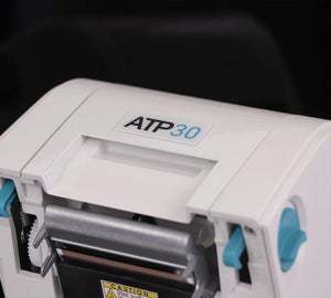 Geopende ATP-30 labelprinter met zichtbare printkop