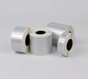 Rollen met gestanste industrial polyester labels voor industriële identificatie