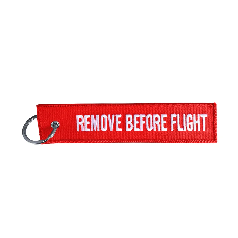 Simoni Racing Sleutelhanger Remove Before Flight - Rood